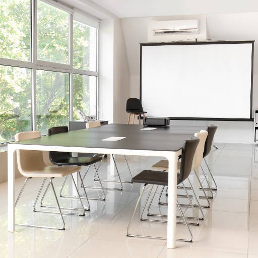 Room with projector prepared for conference in office Training for Trainers 11